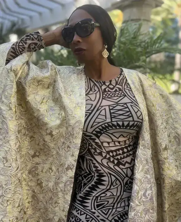 Terrah Bennett Smith in a gold and black patterned coat